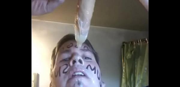  Faggot dripping with loads of cum from a condom